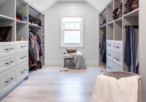 CE-Custom-Gallery17 A walk-in closet with numerous custom cabinets.