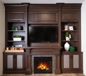CE-Custom-Gallery20 A living room with custom cabinets and a fireplace.
