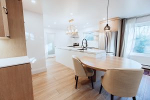 CE-Kitchen-Gallery14 A kitchen with a wooden table and chairs.