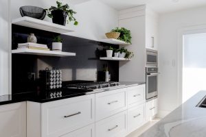 CE-Kitchen-Gallery24 A white kitchen with white cabinets under the stoves.