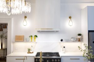 CE-Kitchen-Gallery27 A kitchen with white cabinets and a refrigerator.