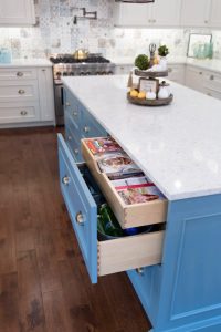 CE-Kitchen-Gallery30 A blue and white kitchen with hardwood floors.