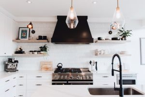 CE-Kitchen-Gallery41 A white kitchen with black pendant lights.