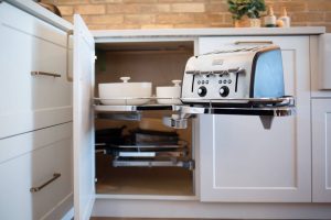 CE-Kitchen-Gallery7 A kitchen with a toaster in the cabinet.